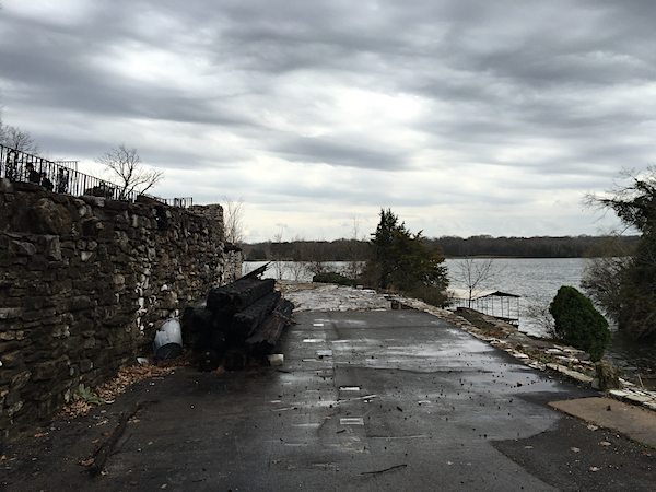 As you walk down the lower driveway, there is an open concert slab where the home once stood.