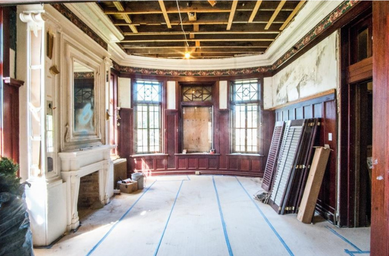 An empty living room view inside of the historic Cottonland Castle