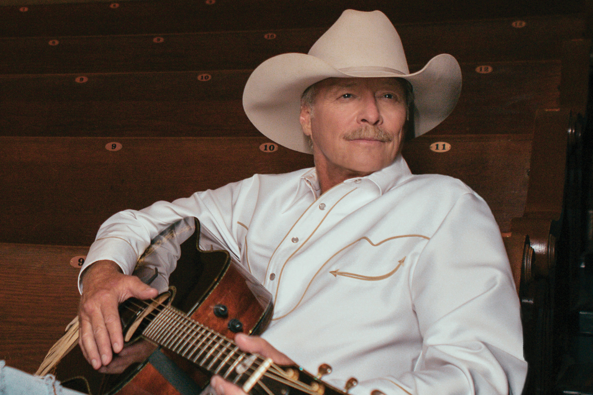 Alan Jackson poses with guitar