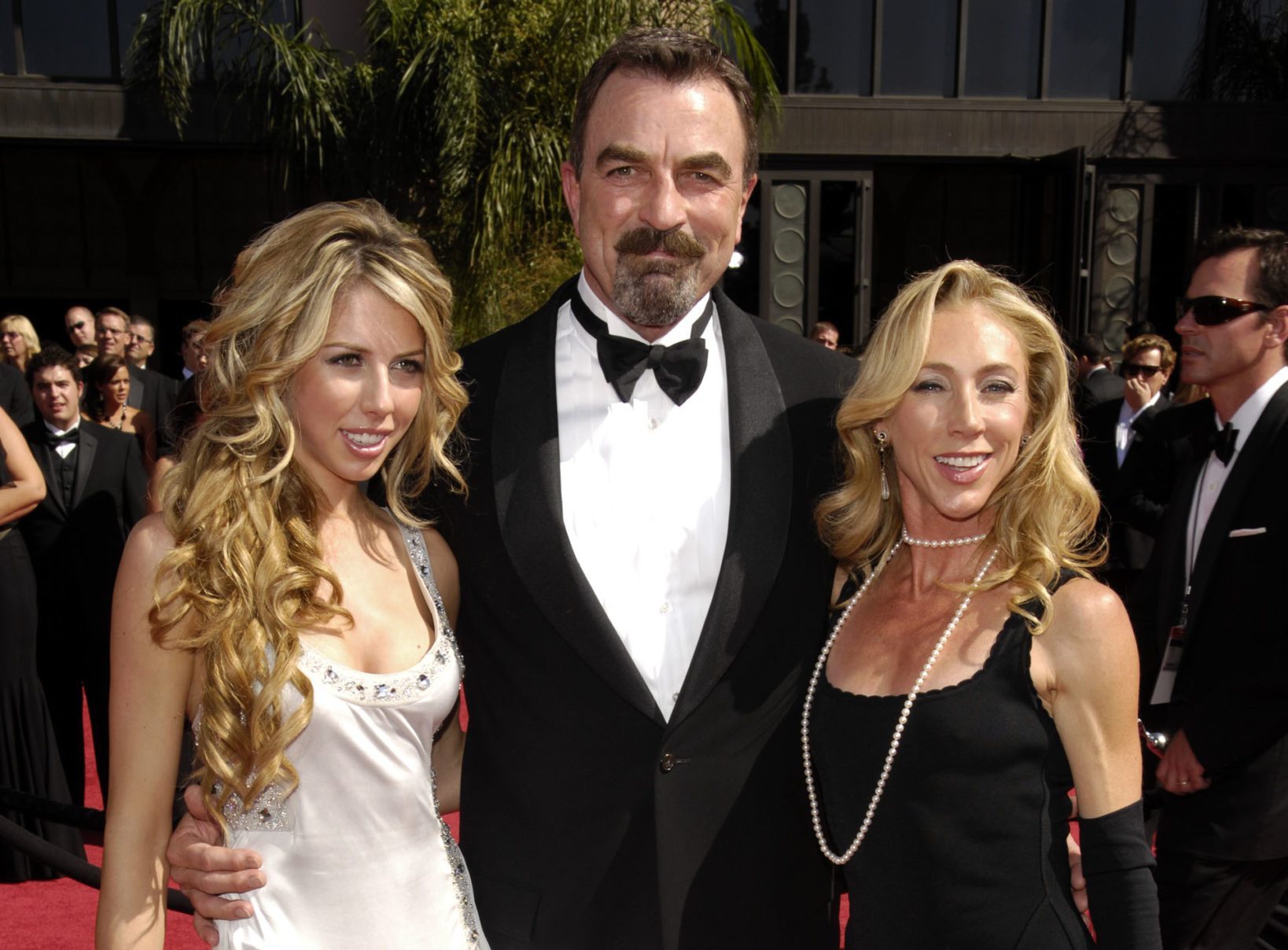 Actor Tom Selleck arrives at the 59th Primetime Emmy Awards Sunday, Sept. 16, 2007, at the Shrine Auditorium in Los Angeles with his wife Jillie Mack, right, and daughter, Hannah Selleck.