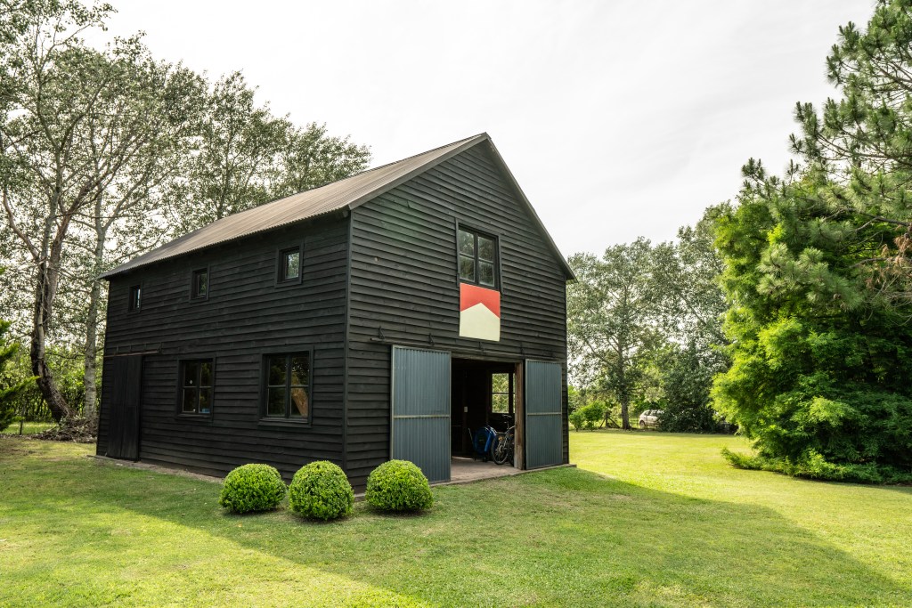 Wooden barn in the backyard of the cottage.
