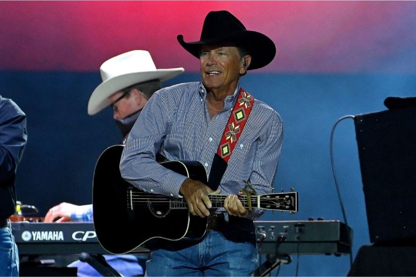 George Strait performs on stage during ATLive 2021 concert at Mercedes-Benz Stadium on November 05, 2021 in Atlanta, Georgia. 