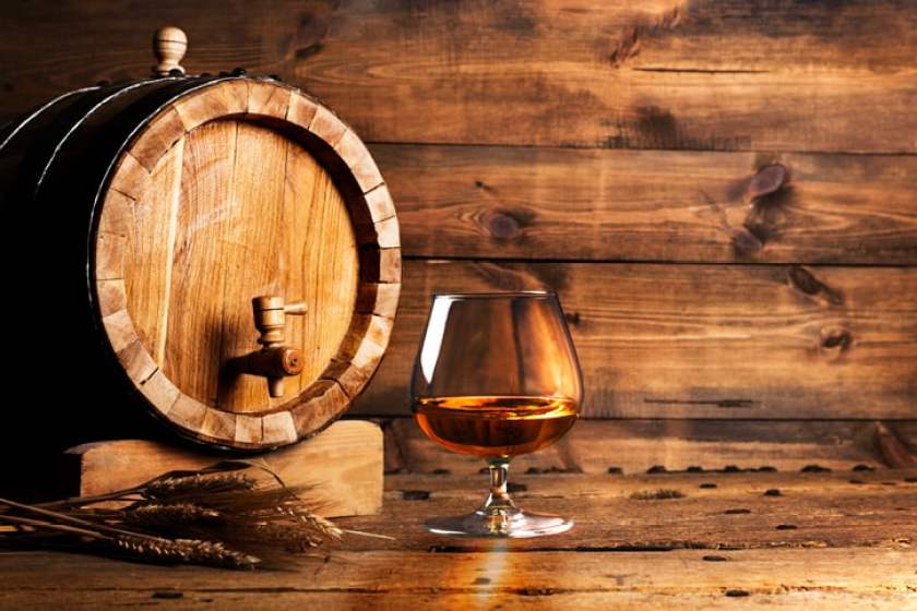 Brendy glass and old oak barrel