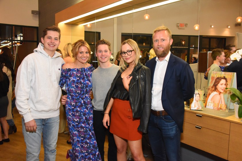 LOS ANGELES, CA - MARCH 24: Lev Bure, Candace Cameron, Maksim Bure, Natasha Bure and Valeri Bure attend Natasha Bure "Let's Be Real" Los Angeles book launch party at Eden By Eden Sassoon on March 24, 2017 in Los Angeles, California.