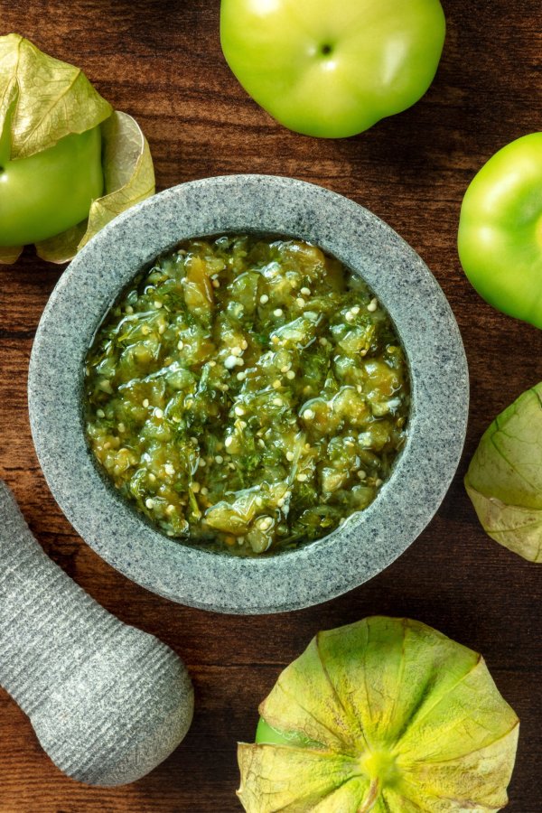 green sauce, in a molcajete,