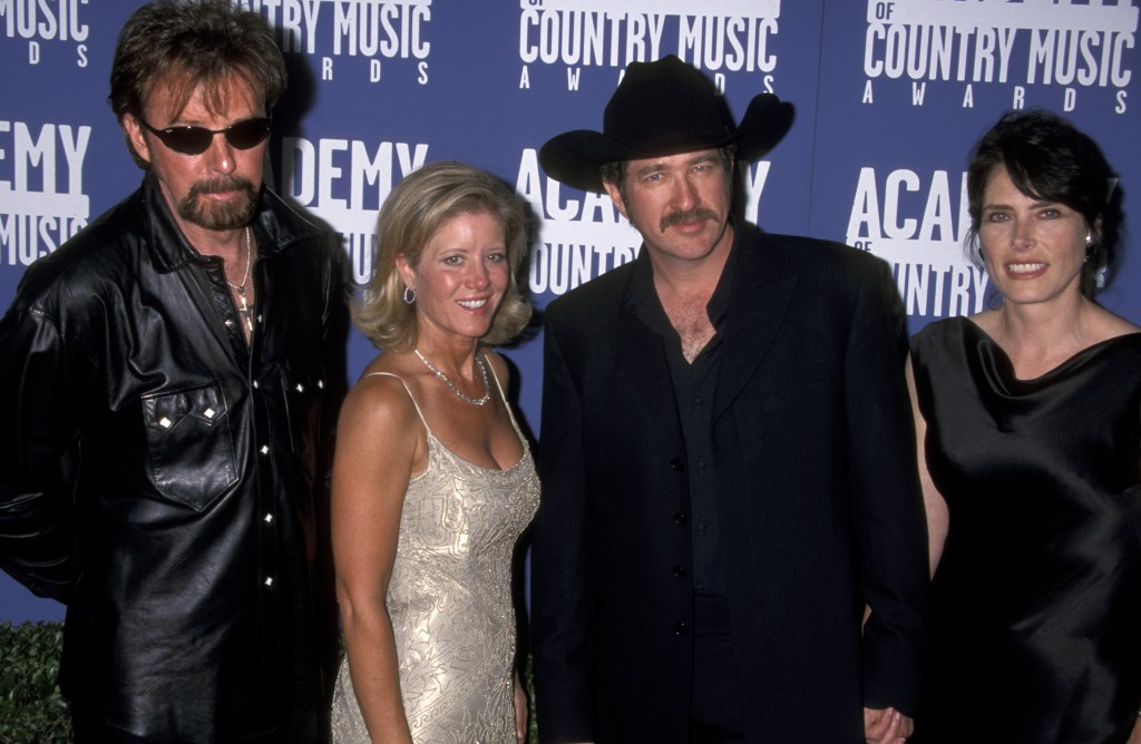 Ronnie Dunn and wife Janine Dunn, and Kix Brooks and wife Barbara Brooks 
