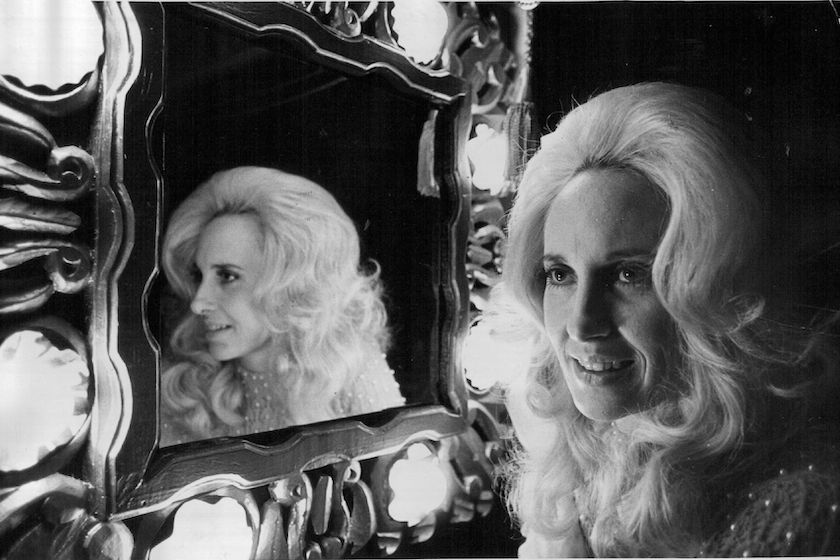 MINNEAPOLIS, MN. - MARCH 1975: Country music singer, songwriter, performer Tammy Wynette at the dressing room mirror aboard her bus before a show at the Guthrie Theater in Minneapolis, Minn., Saturday, March 22, 1975.Minneapolis Tribune photo. 
