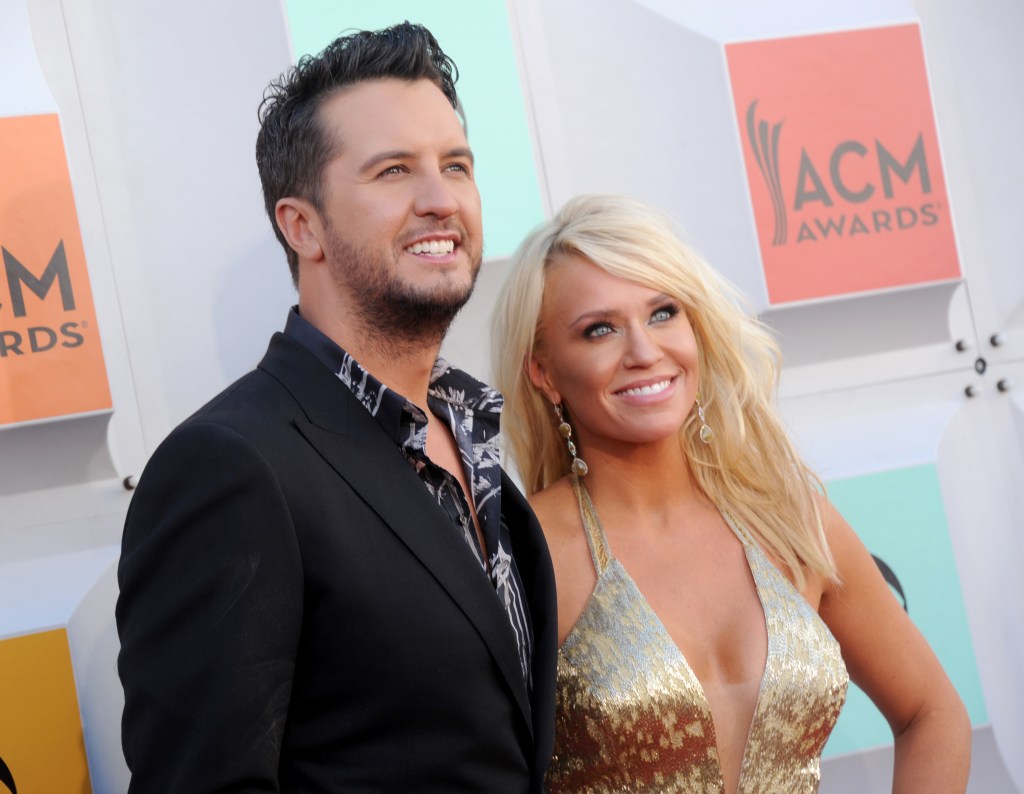 Singer Luke Bryan and wife Caroline Boyer arrive at the 51st Academy Of Country Music Awards at MGM Grand Garden Arena on April 3, 2016 in Las Vegas, Nevada. 
