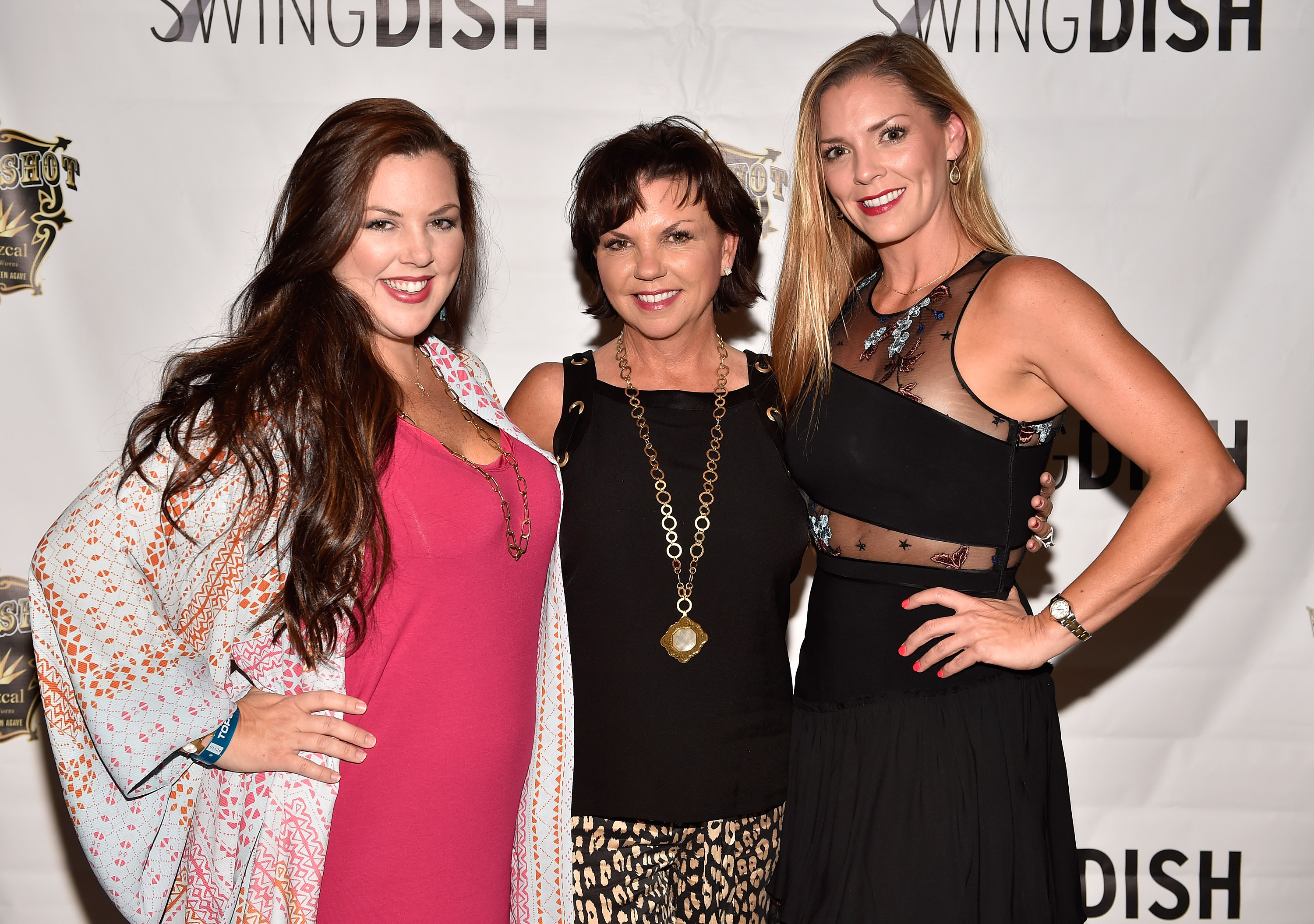 LAS VEGAS, NV - AUGUST 16: (L-R) Singer Krystal Sandubrae, designer Tricia Covel and Shelley Covel attend the debut of SWINGDISH women's golf apparel 2017 spring/summer collection by designer Tricia Covel during the PGA show at Topgolf Las Vegas on August 16, 2016 in Las Vegas, Nevada. 