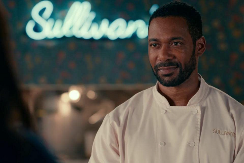 Dion Johnstone as Erik Whitley in Sweet Magnolias standing in Sullivans Restaurant
