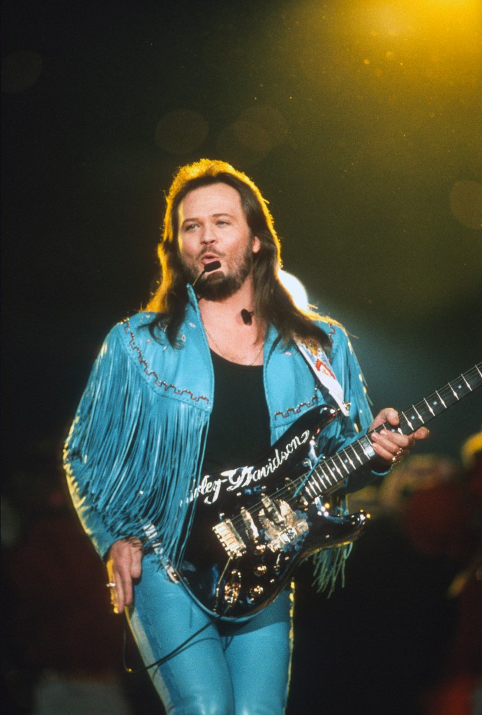 ATLANTA, GA - JANUARY 30:  Travis Tritt preforms during the halftime show of Super Bowl XXVIII between the Dallas Cowboys and Buffalo Bills on January 30, 1994 at the Georgia Dome in Atlanta, Georgia. The Cowboys won the Super Bowl 30 -13. 