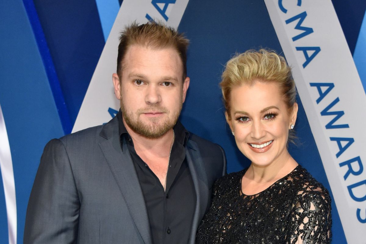 Kyle Jacobs (L) and Kellie Pickler (R) attend the 51st annual CMA Awards at the Bridgestone Arena on November 8, 2017 in Nashville, Tennessee.