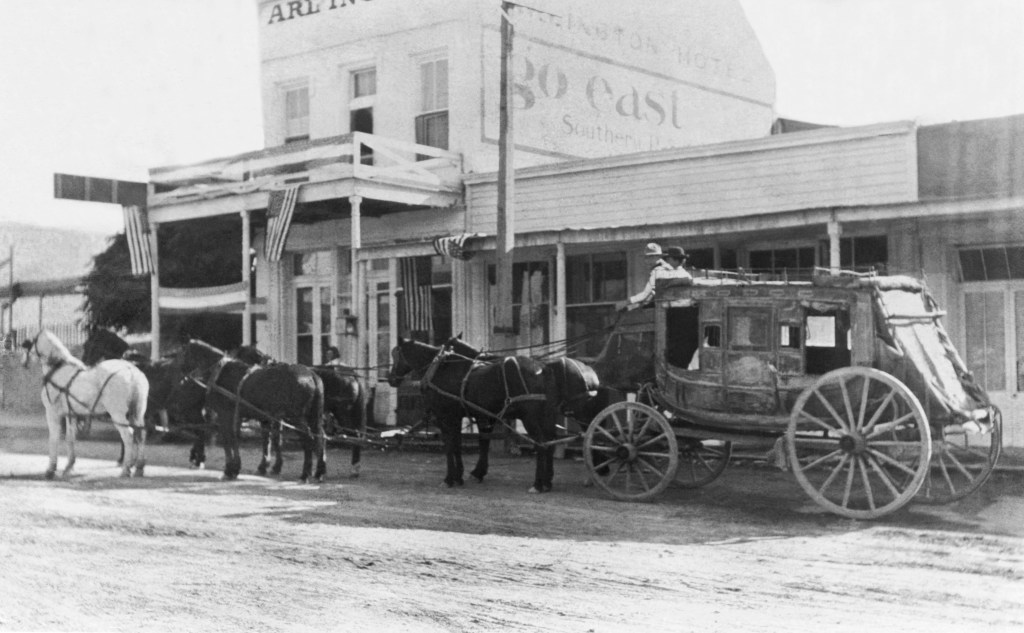 A thorobrace stagecoach in Tombstone, Tombstone, Arizona, circa 1882.
