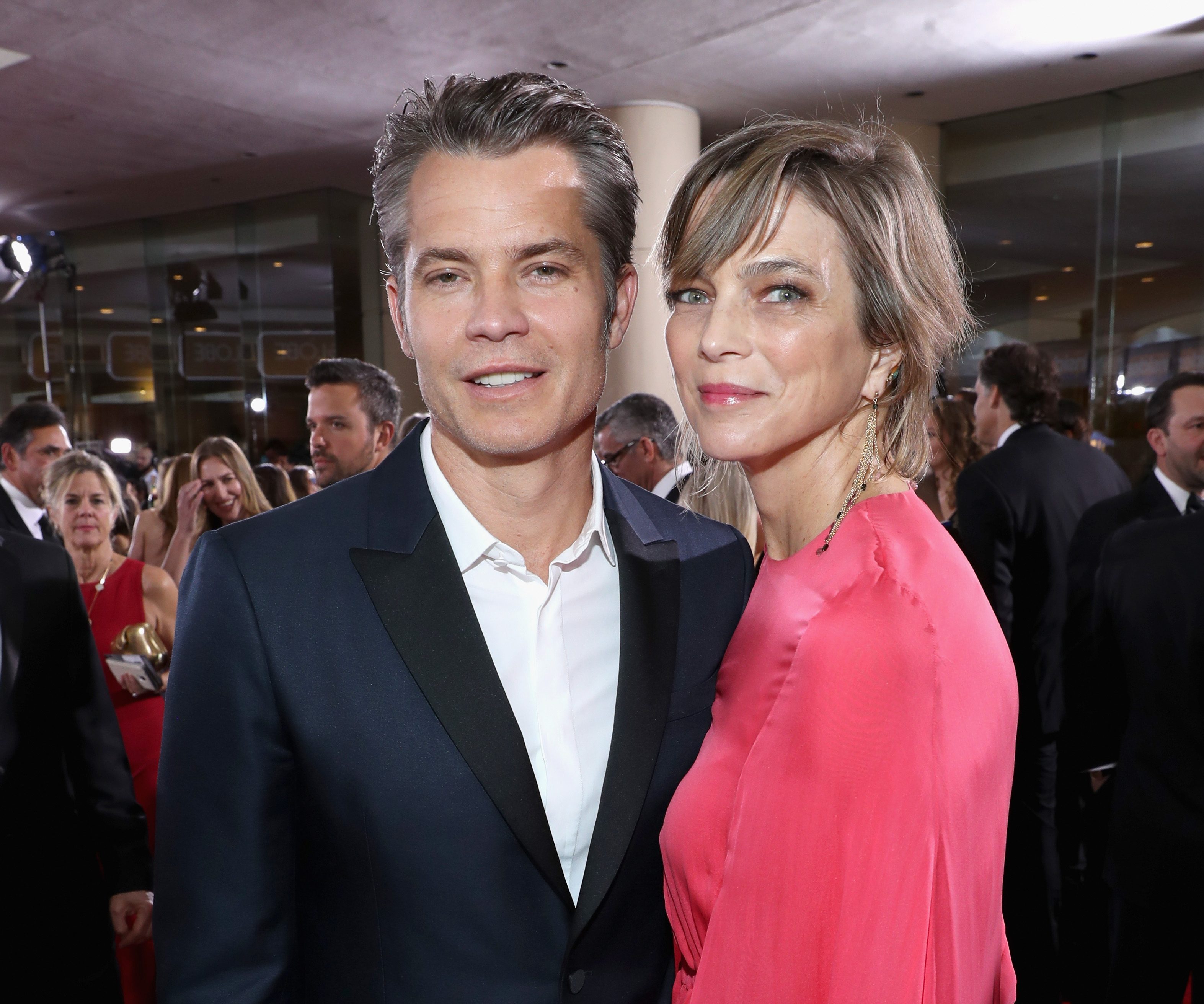 BEVERLY HILLS, CA - JANUARY 08: Actor Timothy Olyphant (L) and wife Alexis Knief at the 74th annual Golden Globe Awards sponsored by FIJI Water at The Beverly Hilton Hotel on January 8, 2017 in Beverly Hills, California.