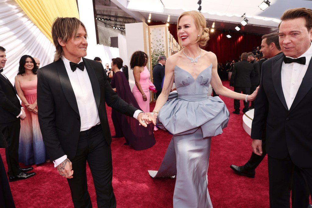 (L-R) Keith Urban, Nicole Kidman and Kevin Huvane attend the 94th Annual Academy Awards at Hollywood and Highland on March 27, 2022 in Hollywood, California.