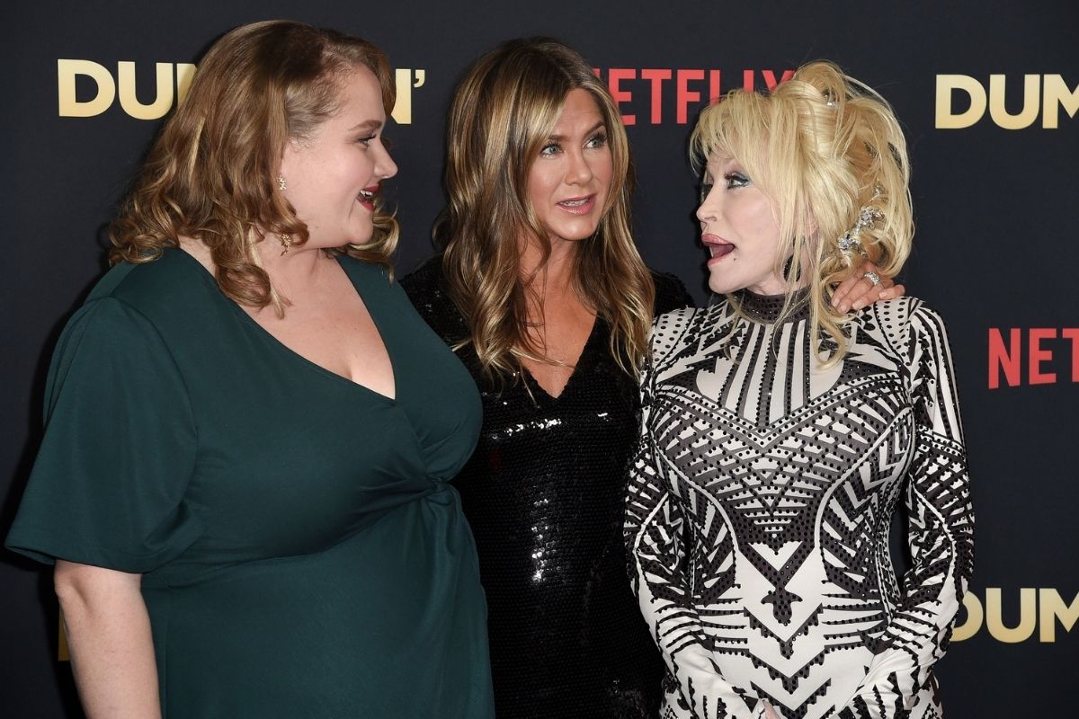 Danielle Macdonald and Jennifer Aniston and Dolly Parton