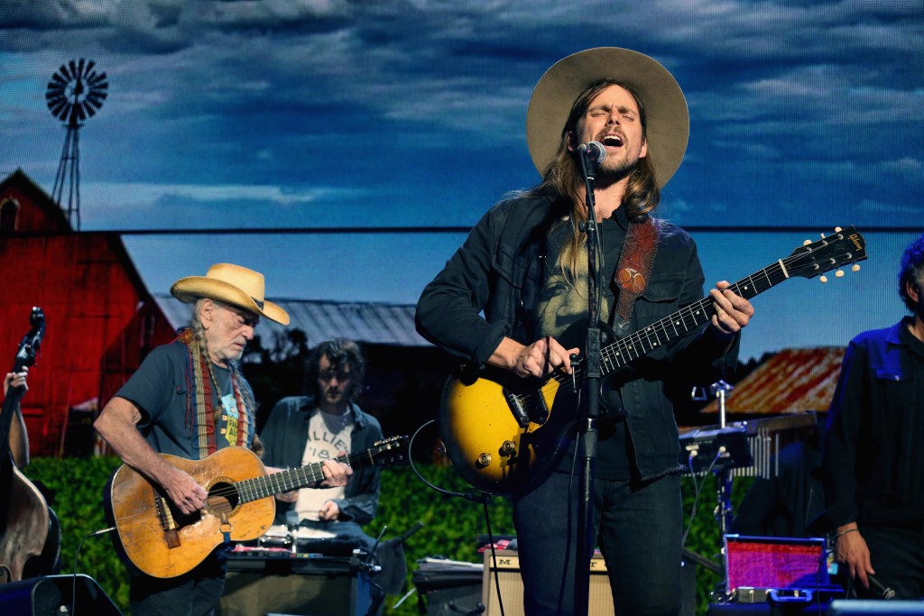 EAST TROY, WI - SEPTEMBER 21: Willie Nelson (L) and Lukas Nelson perform in concert during Farm Aid 34 at Alpine Valley Music Theatre on September 21, 2019 in East Troy, Wisconsin.