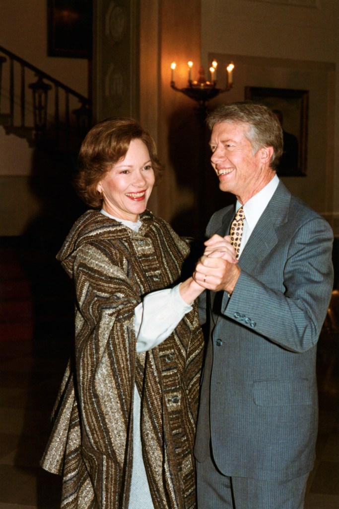 President and Mrs. Carter break into an impromptu waltz on the State Floor while awaiting the arrival of Vice Premier Deng Xiaoping and party to sign a series of cultural and scientific agreements at the conclusion of the formal state visit.