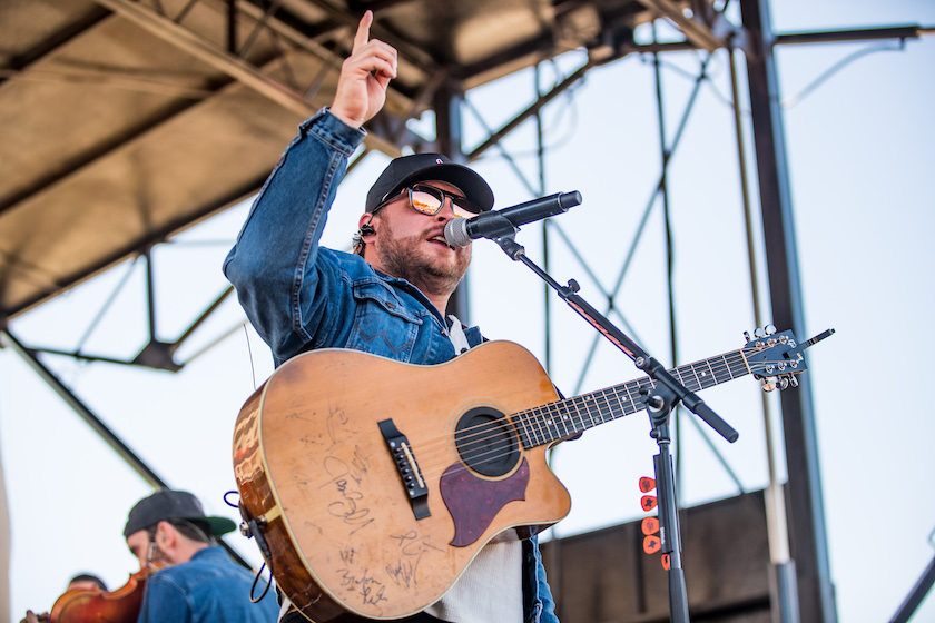 LUBBOCK, TEXAS - NOVEMBER 13: The Josh Abbott Band performs before the college football game between the Texas Tech Red Raiders and the Iowa State Cyclones at Jones AT&T Stadium on November 13, 2021 in Lubbock, Texas. 