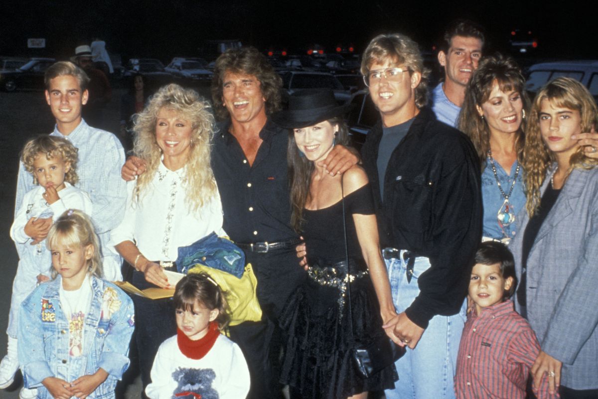 Christopher Landon and date, Sean Landon, Jennifer Landon, Cindy Clerico, actor Michael Landon, Michael Landon Jr. and date, Mark Landon, Leslie Landon and Shawna Landon attend Third Annual Moonlight Roundup Benefiting Free Arts for Abused Children on July 29, 1989 at Calamigos Ranch in Malibu, California
