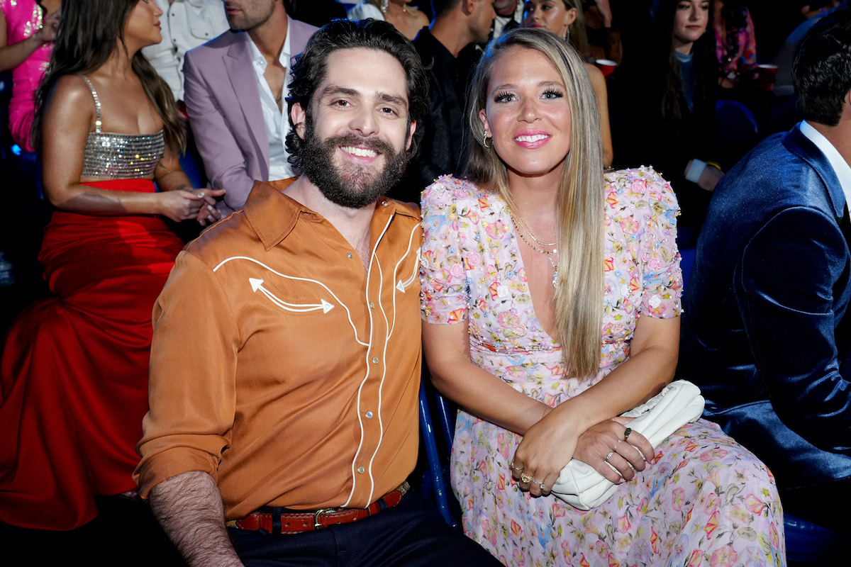 NASHVILLE, TENNESSEE - APRIL 11: (L-R) Thomas Rhett and Lauren Akins attend the 2022 CMT Music Awards at Nashville Municipal Auditorium on April 11, 2022 in Nashville, Tennessee.