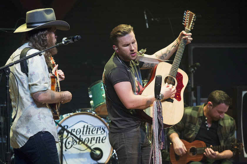 NEW ORLEANS, LA - JANUARY 05: John Osborne (L) and TJ Osborne of the band Brothers Osborne performs at House of Blues on January 5, 2017 in New Orleans, Louisiana.