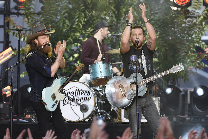 NASHVILLE, TN - JUNE 07:  John Osborne (L) and T.J. Osborne of Brothers Osborne perform during the 2017 CMT Music Awards at the Music City Center on June 7, 2017 in Nashville, Tennessee. 