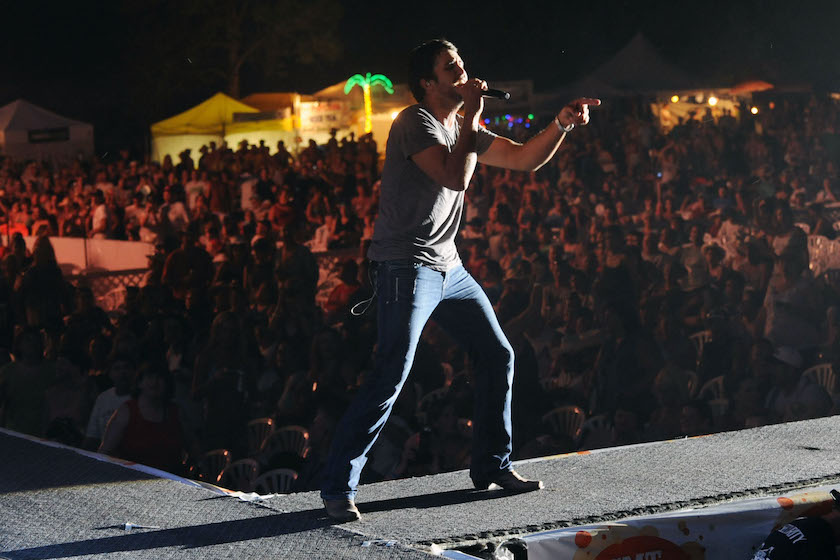 MANHATTAN, KS - JUNE 25: Recording Artist Luke Bryan performs during Country Stampede 2009 at Tuttle Creek State Park on June 25, 2009 in Manhattan, Kansas. 
