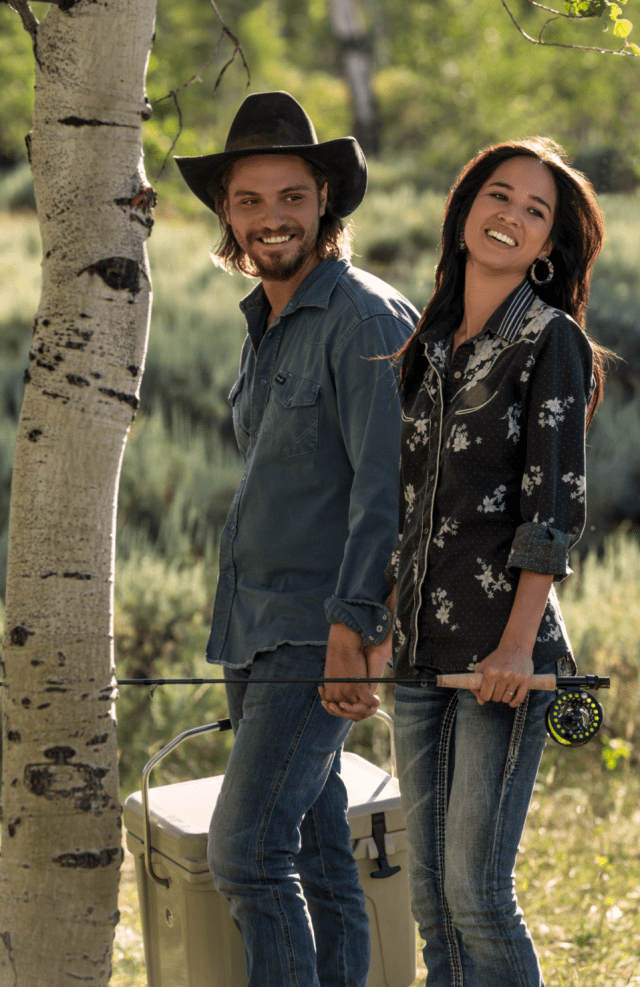 Luke Grimes as Kayce Dutton and Kelsey Asbille as Monica Dutton in 'Yellowstone'