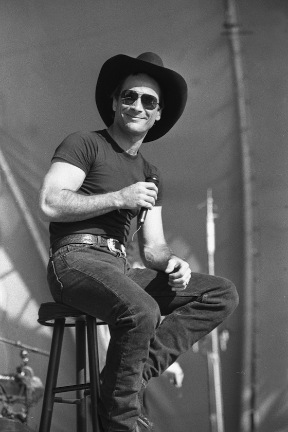 Singer and songwriter Clint Black is shown performing on stage during a live concert appearance on July 11, 1993.