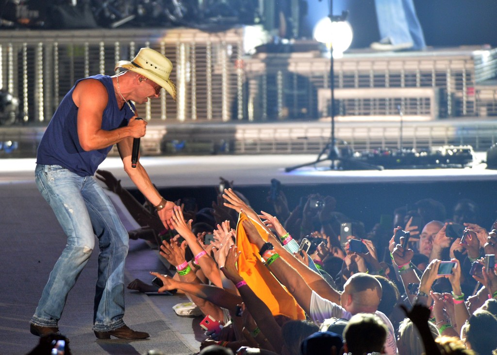 ATLANTA, GA - AUGUST 03: Singer/Songwriter Kenny Chesney performs during Kenny Chesney's No Shoes Nation on Zac Brown's Southern Ground Tour at the Georgia Dome on August 3, 2013 in Atlanta, Georgia (Photo by Rick Diamond/Getty Images for the No Shoes Nation Tour)
