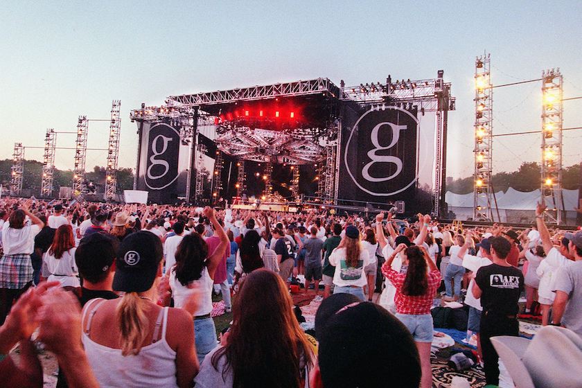 Garth Brooks fans applaud during a free concert by the country singer in New York's Central Park, 07 August. Officials predicted crowds in excess of 200,000 for the evening event.
