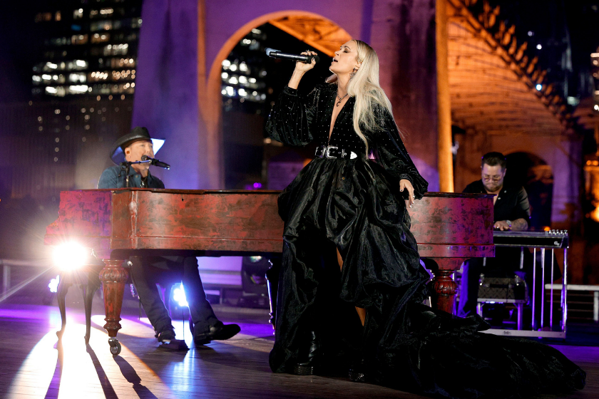 Jason Aldean and Carrie Underwood perform onstage in Nashville, Tennessee for the 2021 American Music Awards