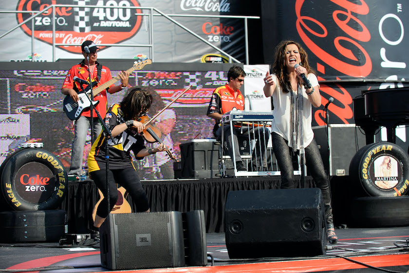 Country Music Superstar Martina McBride performs for fans prior to the NASCAR Sprint Cup Series Coke ZERO 400 Powered by Coca-Cola at Daytona International Speedway on July 2, 2011 in Daytona Beach, Florida.