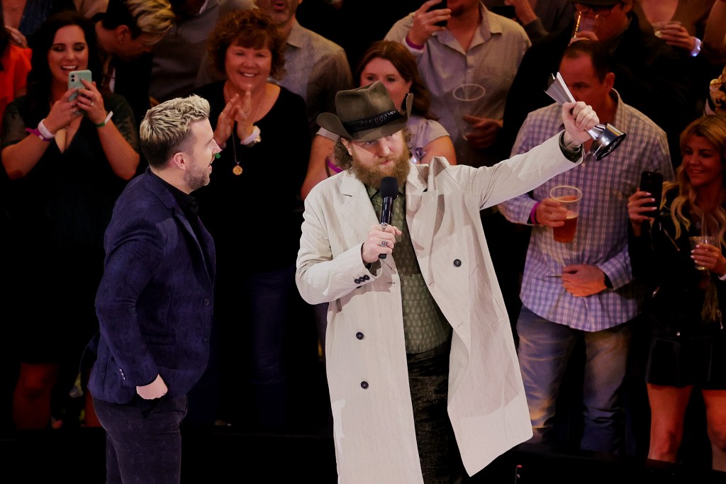 LAS VEGAS, NEVADA - MARCH 07: (L-R) T.J. Osborne and John Osborne of Brothers Osborne accept the Duo of the Year award onstage during the 57th Academy of Country Music Awards at Allegiant Stadium on March 07, 2022 in Las Vegas, Nevada. (Photo by Ethan Miller/Getty Images)