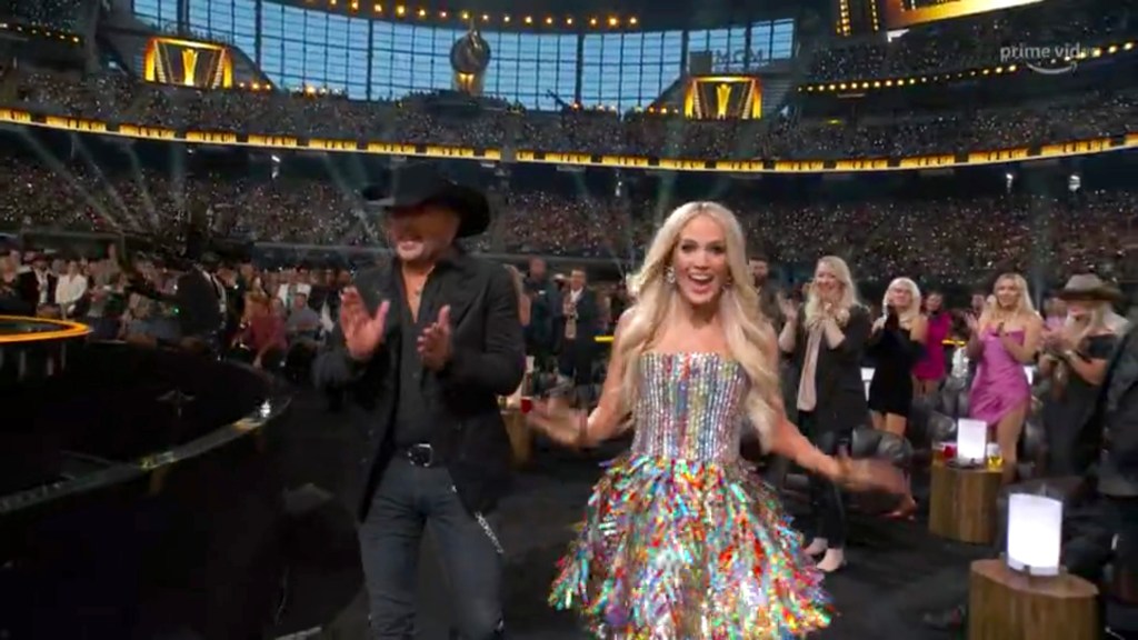 In this screengrab, (L-R) Jason Aldean and Carrie Underwood accept the Single of the Year award for 'If I Didn't Love You' during the 57th Academy of Country Music Awards at Allegiant Stadium on March 07, 2022 in Las Vegas, Nevada. (Photo by Arturo Holmes/ACMA2022/Getty Images for ACM)