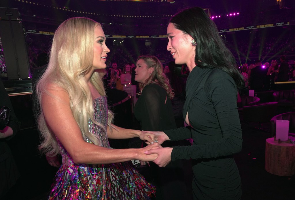 LAS VEGAS, NEVADA - MARCH 07: (L-R) Carrie Underwood and Kelsey Asbille pose during the 57th Academy of Country Music Awards at Allegiant Stadium on March 07, 2022 in Las Vegas, Nevada. (Photo by Kevin Mazur/Getty Images for ACM)