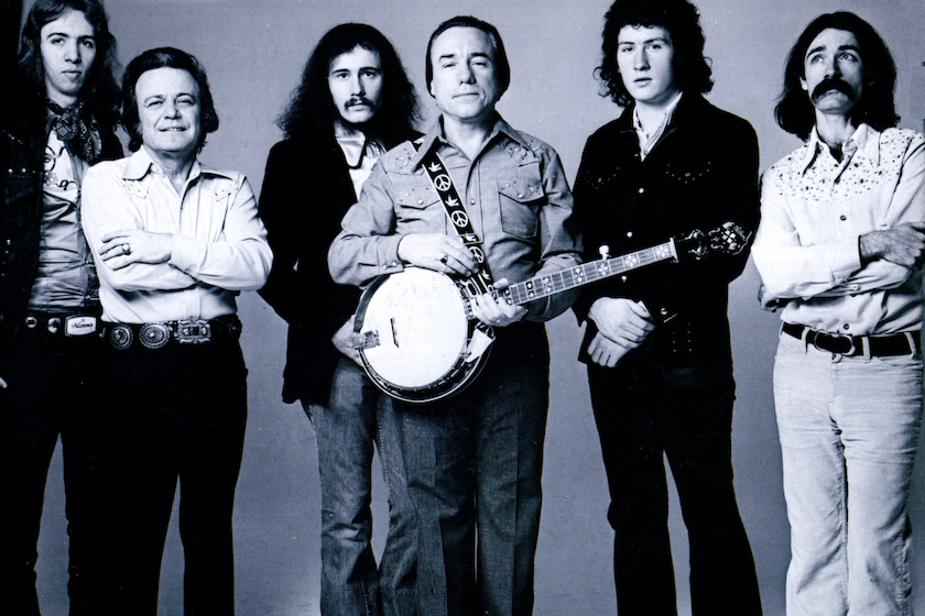 American musician Earl Scruggs (1924-2012) posed with members of the Earl Scruggs Revue in 1974.