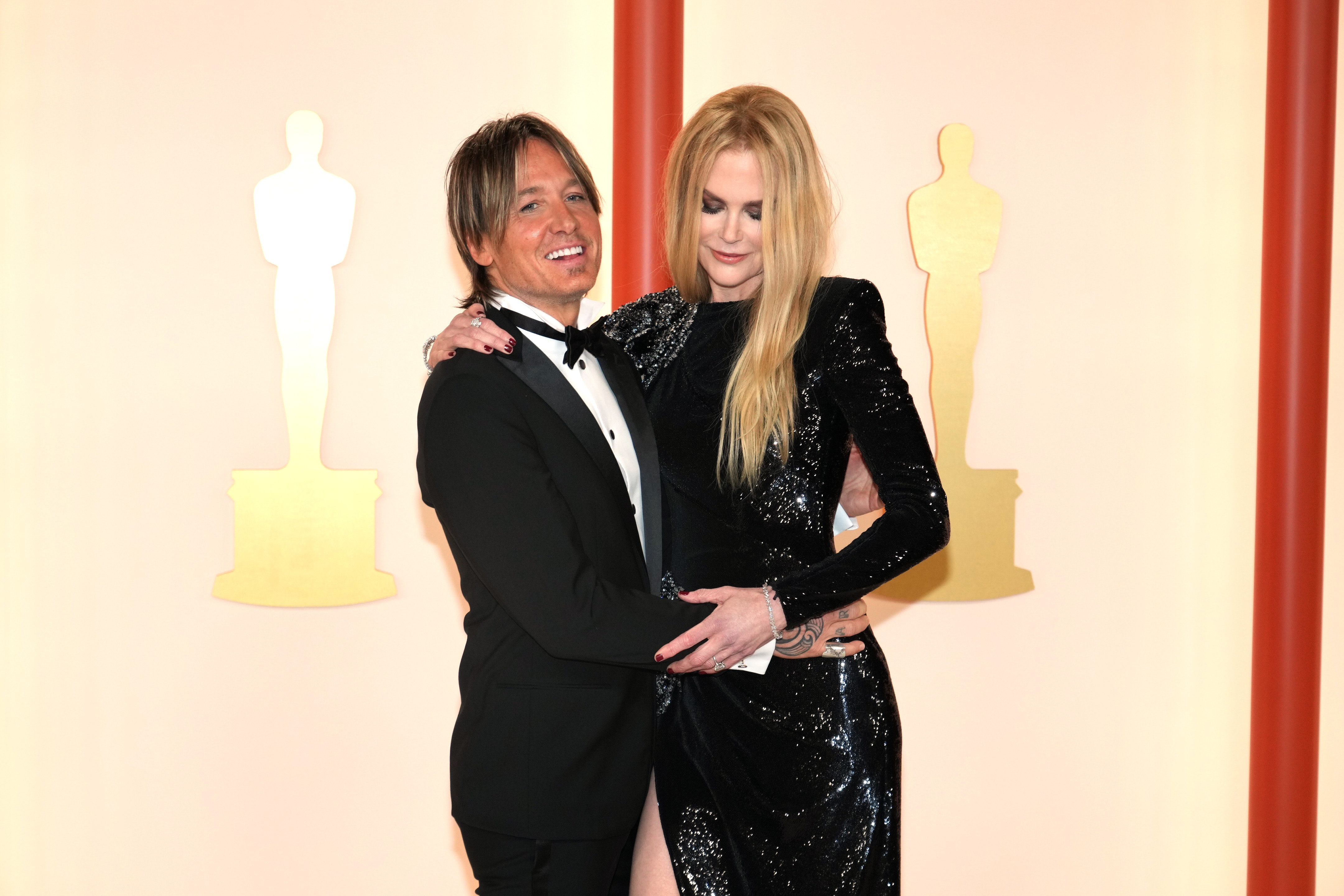HOLLYWOOD, CALIFORNIA - MARCH 12: (L-R) Keith Urban and Nicole Kidman attend the 95th Annual Academy Awards on March 12, 2023 in Hollywood, California.