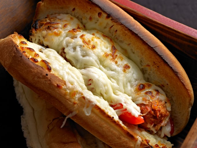 Close up of Meatball Sub Sandwich with melting cheese.