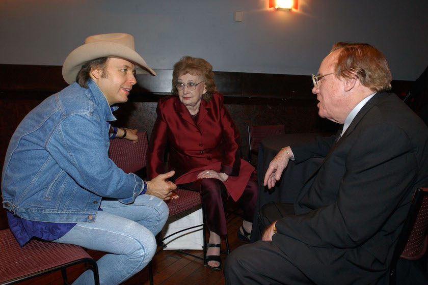 Musician/actor Dwight Yoakam (L) talks with bluegrass music legend Earl Scruggs (R) and Scruggs' wife Louise after a ceremony honoring Yoakam with a star on the Hollywood Walk of Fame June 5, 2003 in Hollywood.