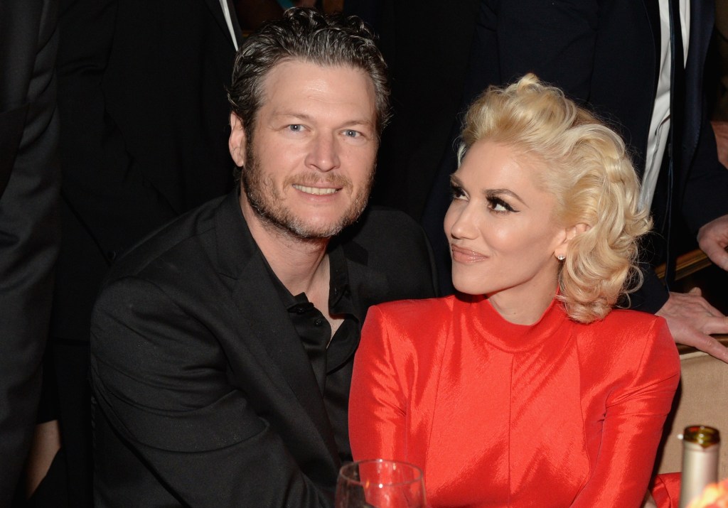  Recording artists Blake Shelton (L) and Gwen Stefani attend the 2016 Pre-GRAMMY Gala and Salute to Industry Icons honoring Irving Azoff at The Beverly Hilton Hotel on February 14, 2016 in Beverly Hills, California.