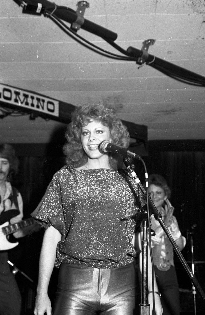 Reba McEntire performs onstage
