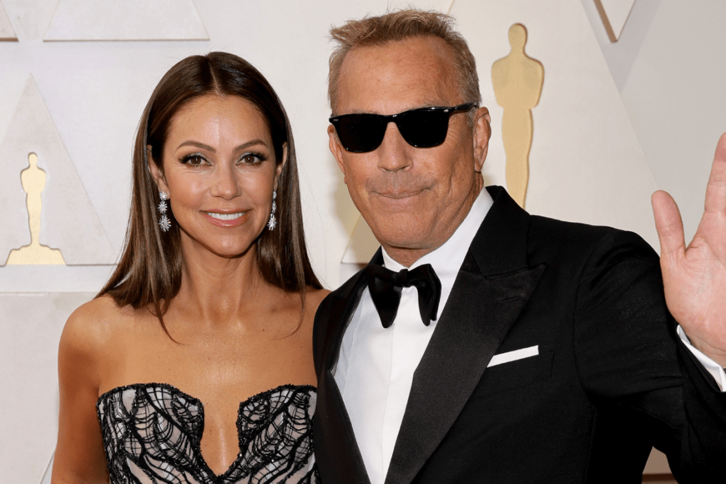 Christine Baumgartner and Kevin Costner attend the 94th Annual Academy Awards at Hollywood and Highland on March 27, 2022 in Hollywood, California.