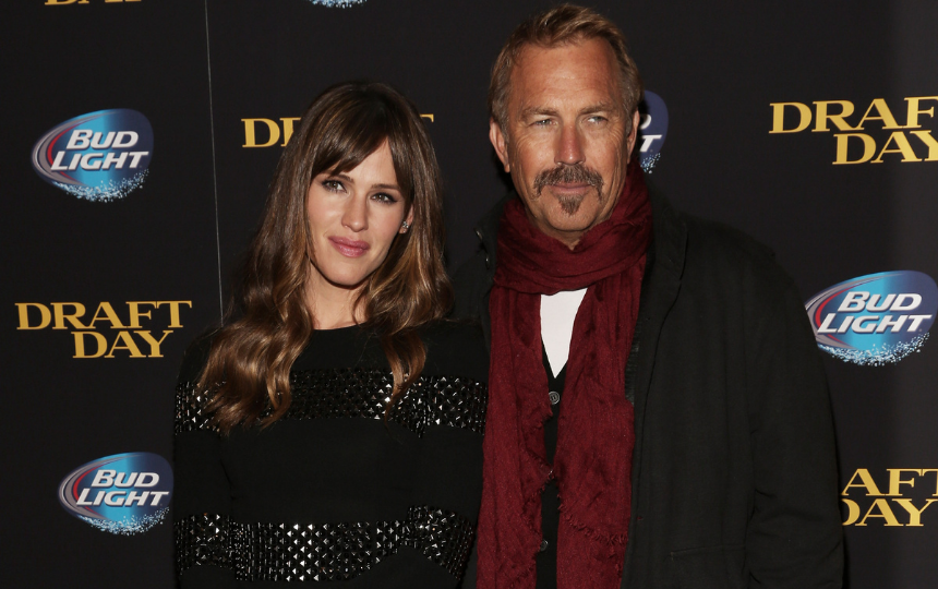 Jennifer Garner (L) and Kevin Costner attend the "Draft Day'" screening