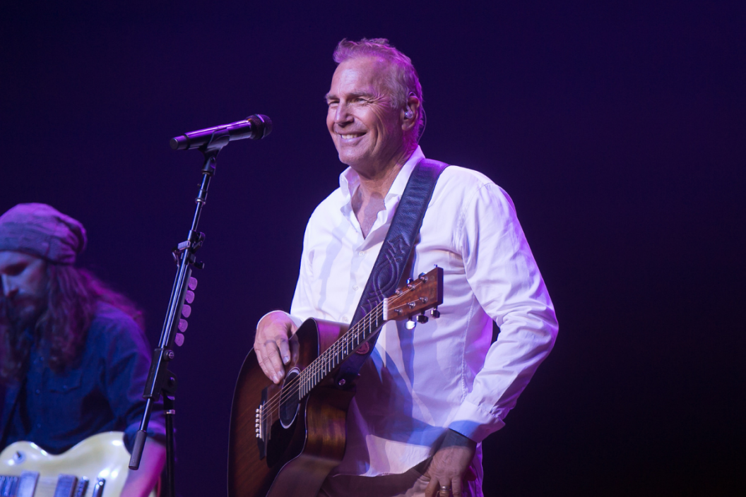 Kevin Costner performs with his band Modern West on stage at Ryman Auditorium on October 26, 2021 in Nashville, Tennessee
