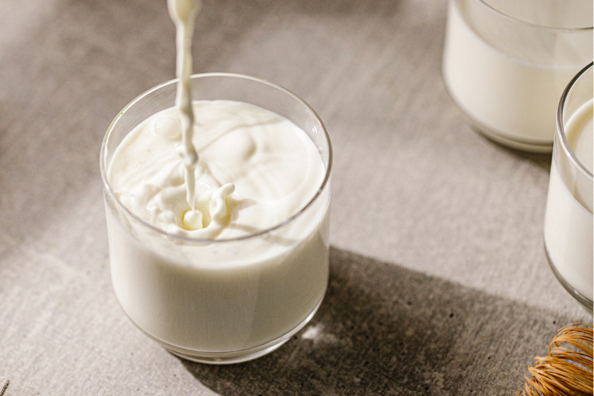 glass of milk on table