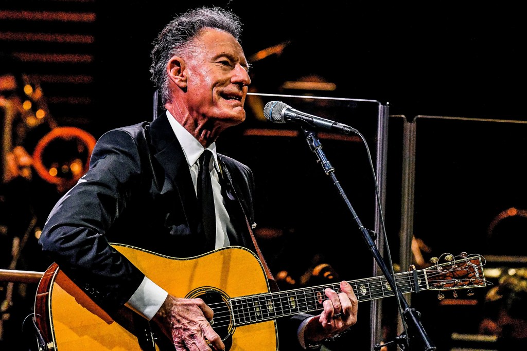 Lyle Lovett performs with The Royal Philharmonic Orchestra during the Dr. Phillips Center Grand Celebration at Dr. Phillips Center for the Performing Arts on January 25, 2022 in Orlando, Florida.