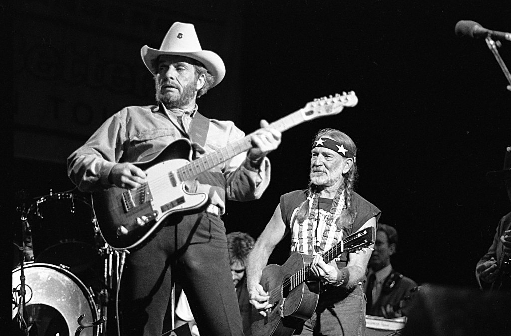 Country musician Merle Haggard performs with a Fender Telecaster with Willie Nelson in August 26, 1988. 