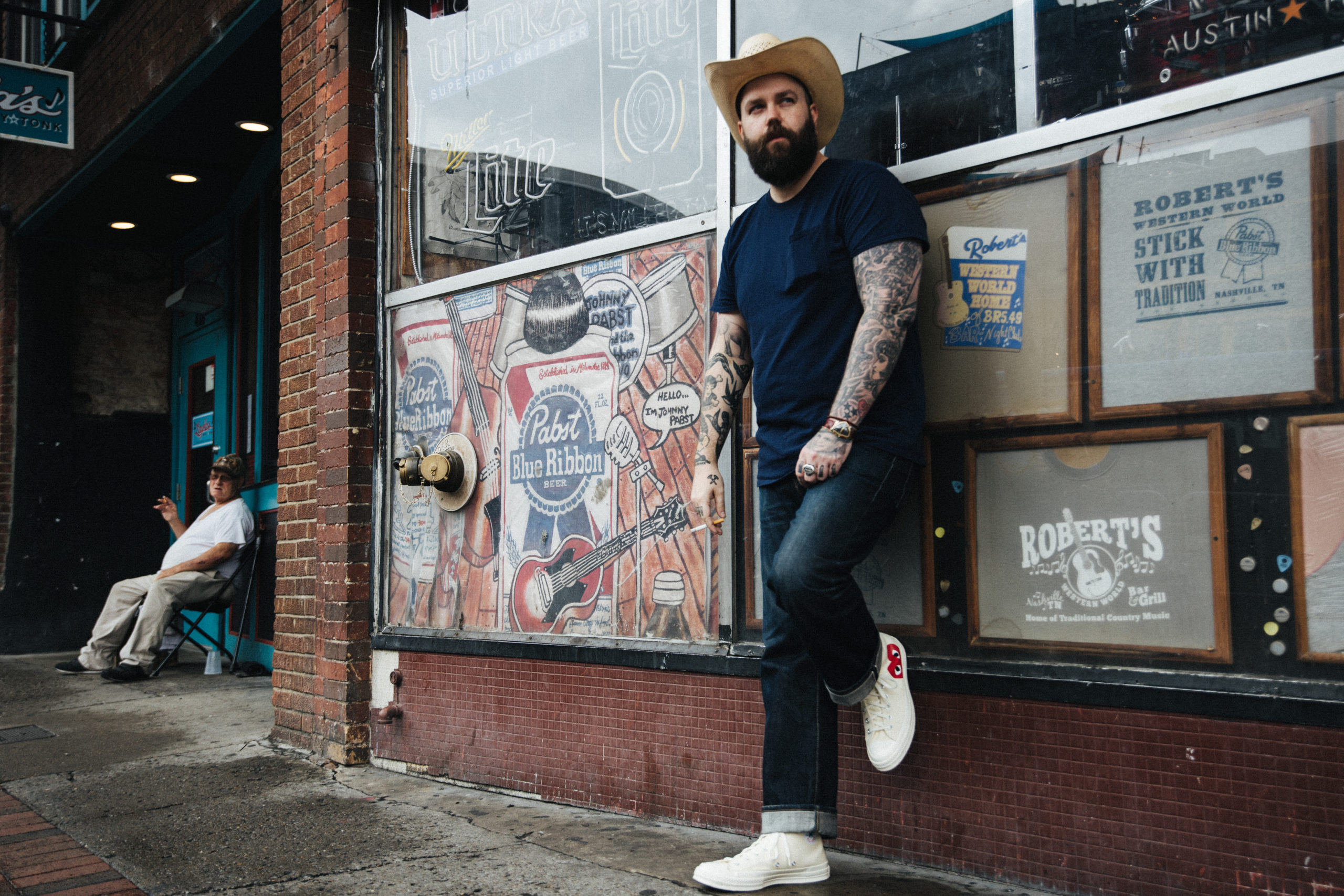 Joshua Hedley in front of Robert's Western World.